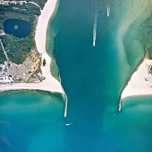 Three Boats Leaving Inlet